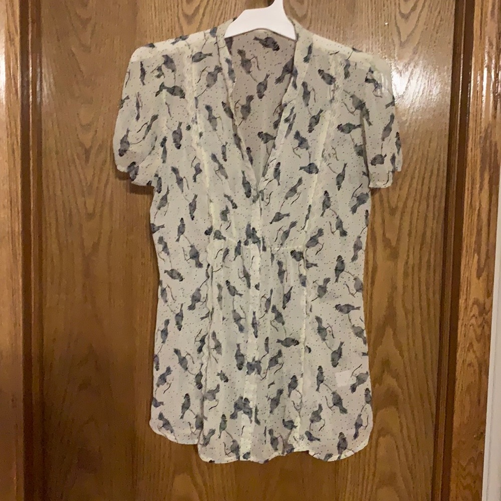 Juniors size large, cream with black birds